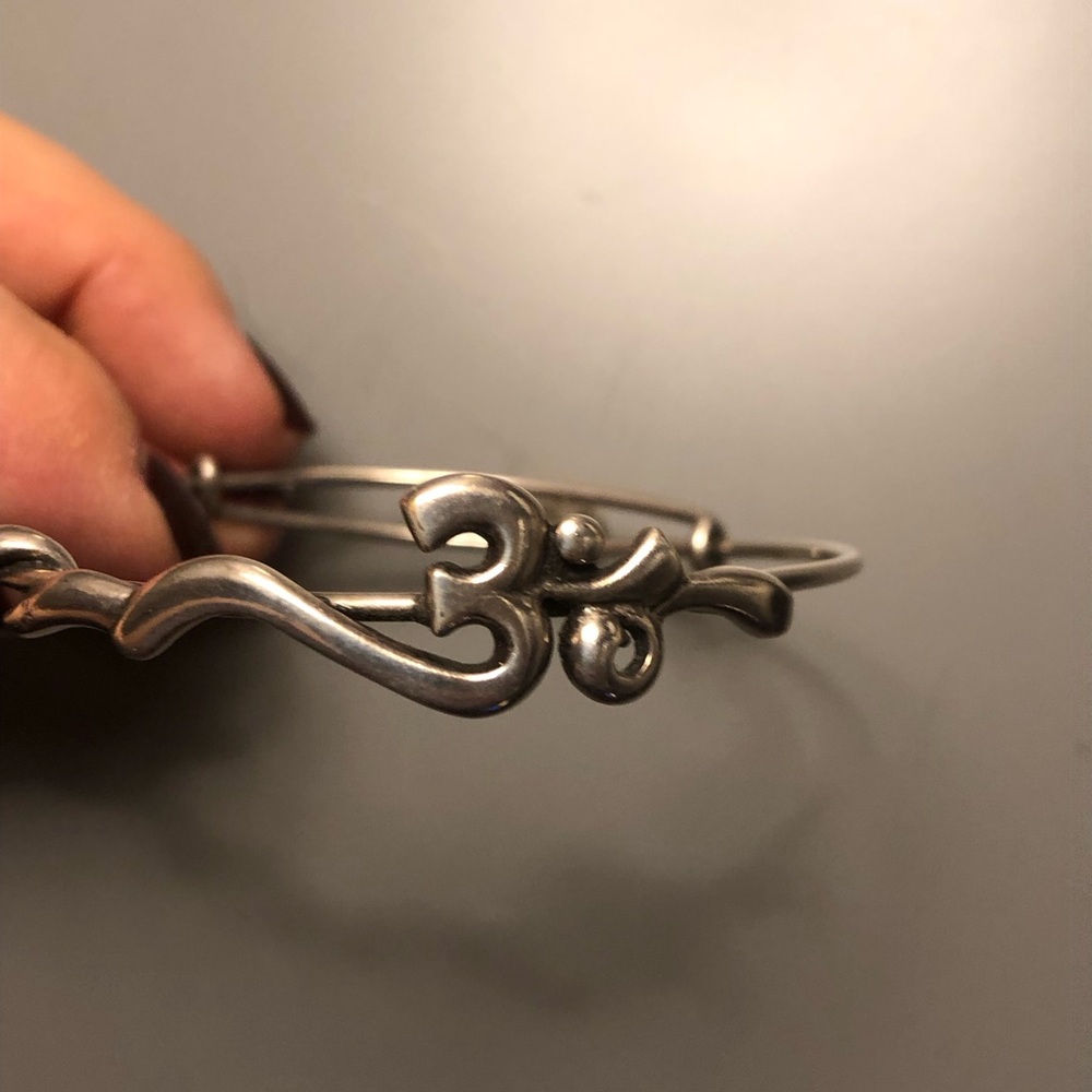 Alex and Ani silver OHM adjustable bangle. Looks great worn in a “stack”